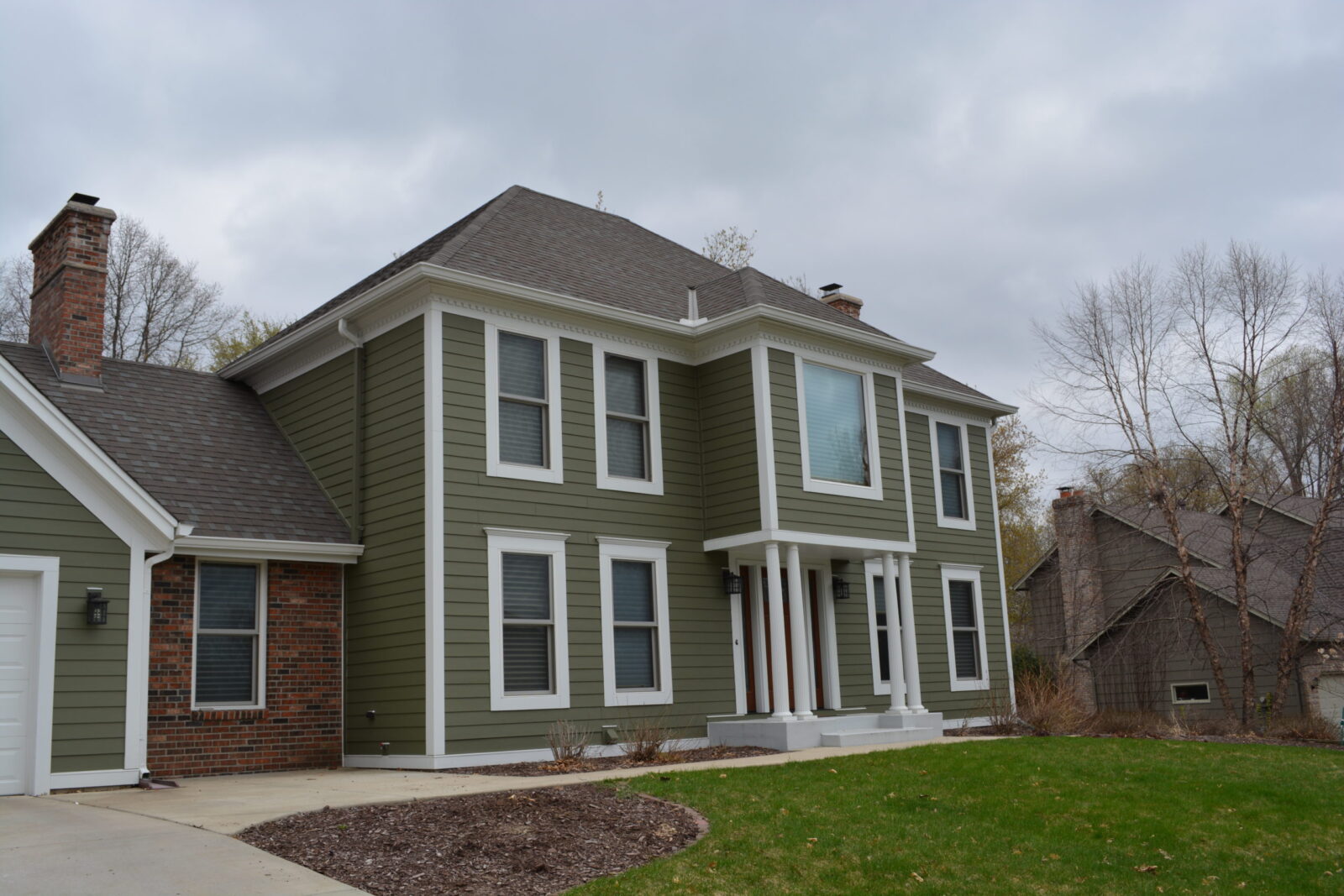 Marvin Elevate fiberglass windows with Mountain Sage James Hardie siding in Lakeville MN