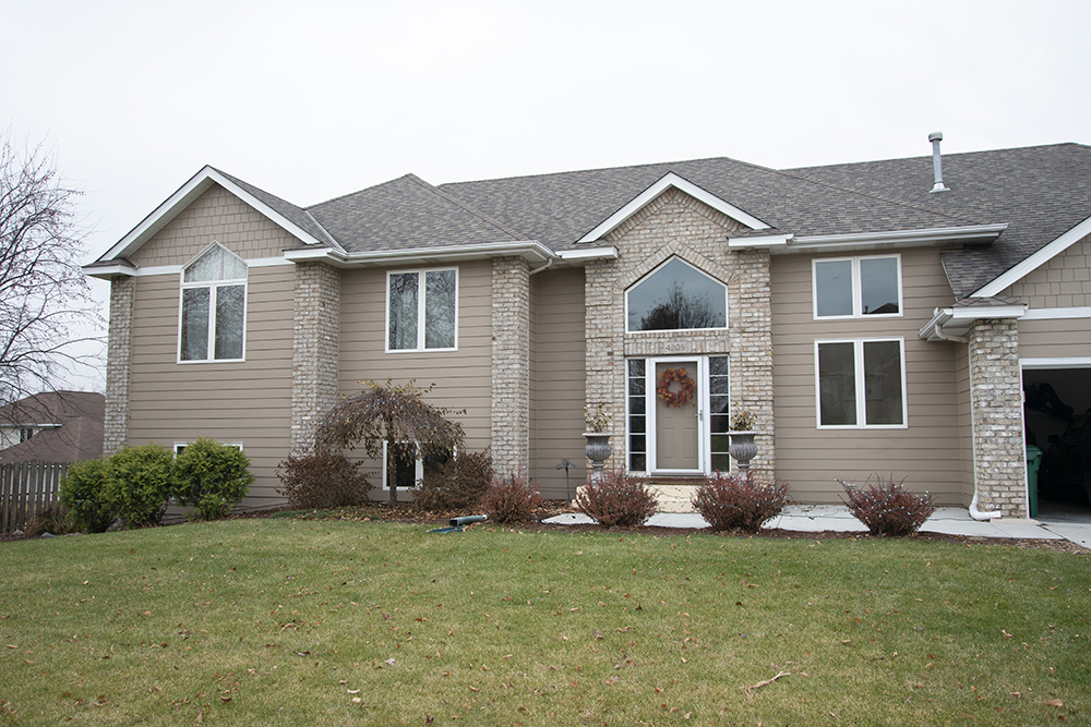 Khaki Brown James Hardie lap siding and Marvin windows on a Lakeville MN home