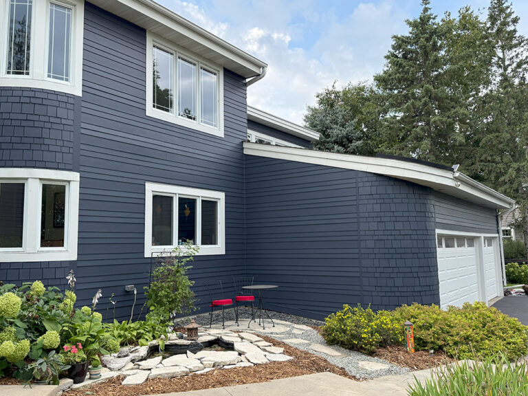Finished exterior of Chanhassen home on bluff overlooking Minnesota River Valley with James Hardie Deep Ocean siding.