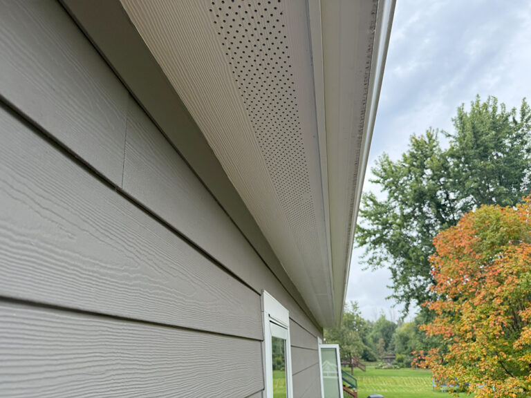 James Hardie Complete Exterior™ showing Aged Pewter siding and durable soffit system on Lino Lakes home.