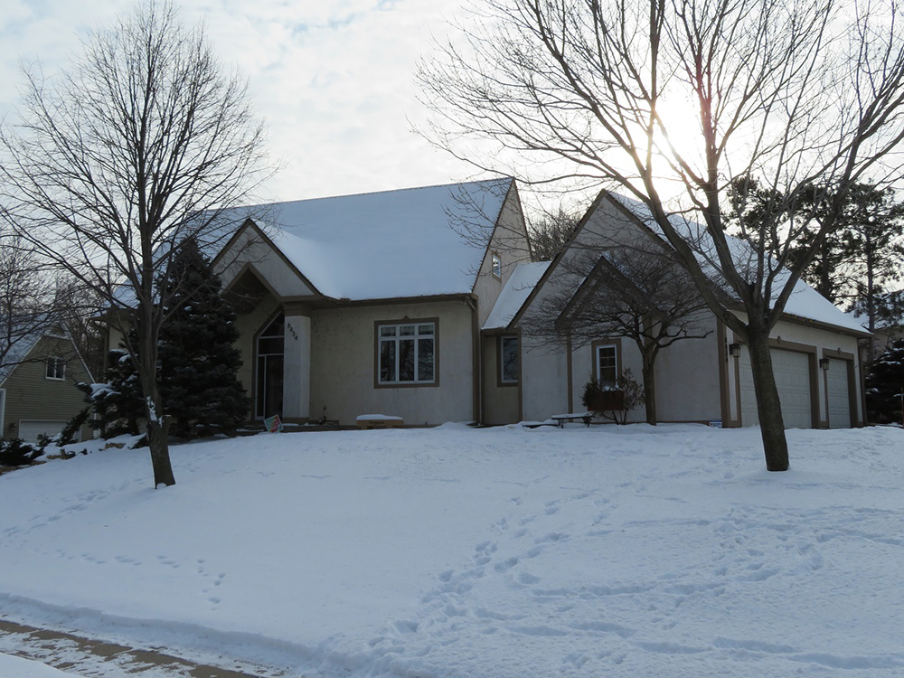 Eden Prairie MN rotted stucco removal before James Hardie siding installation