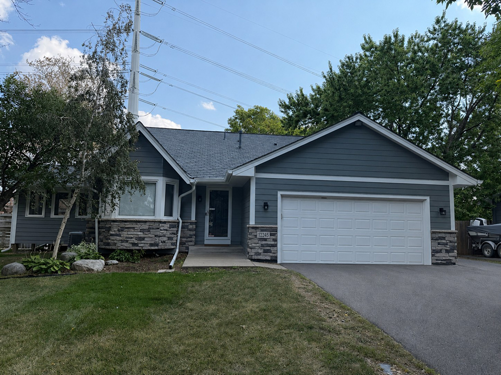 Maple Grove MN home with James Hardie Gray Slate siding and white trim
